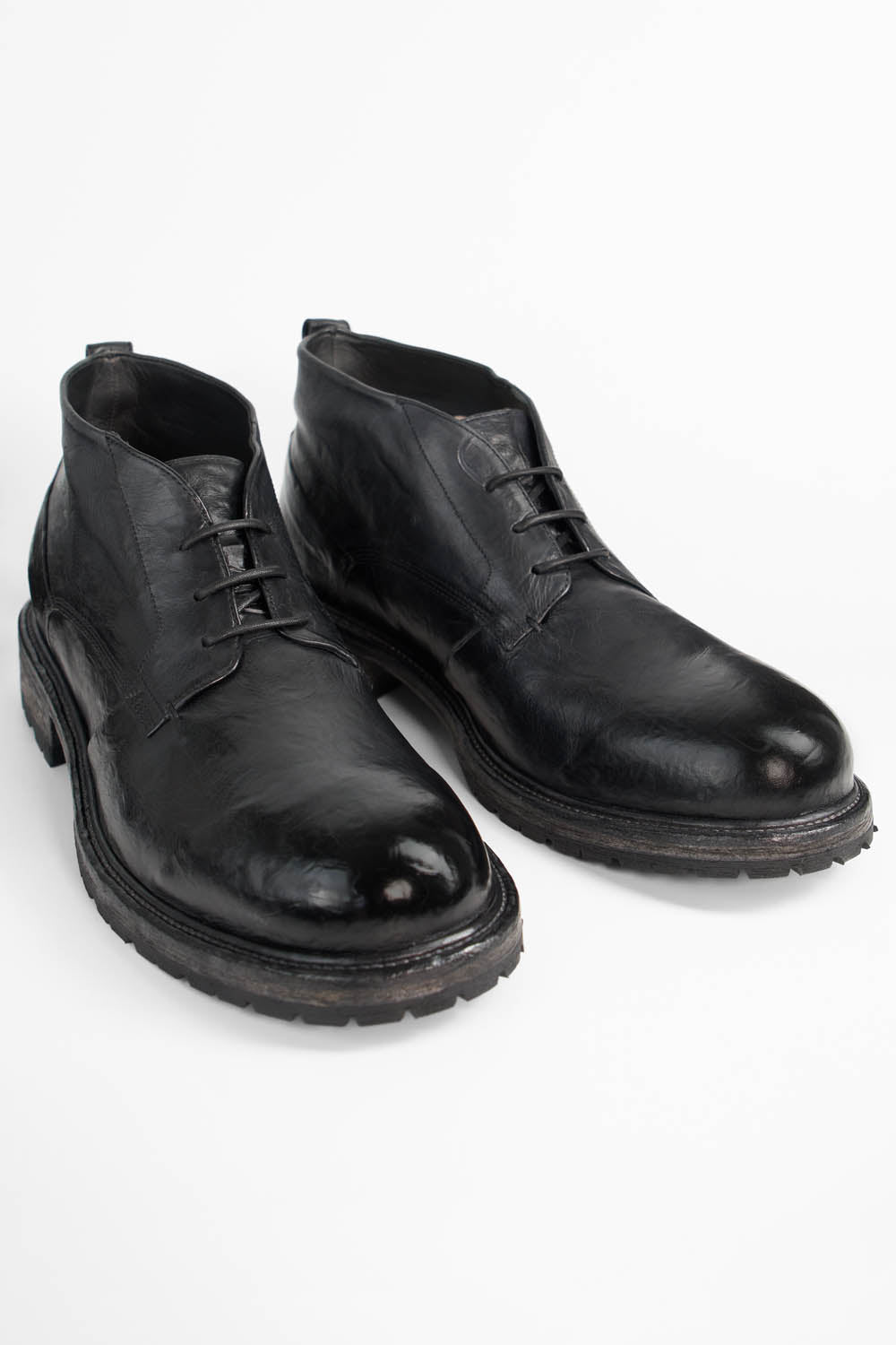 ROWLEY coal-black folded chukka boots.