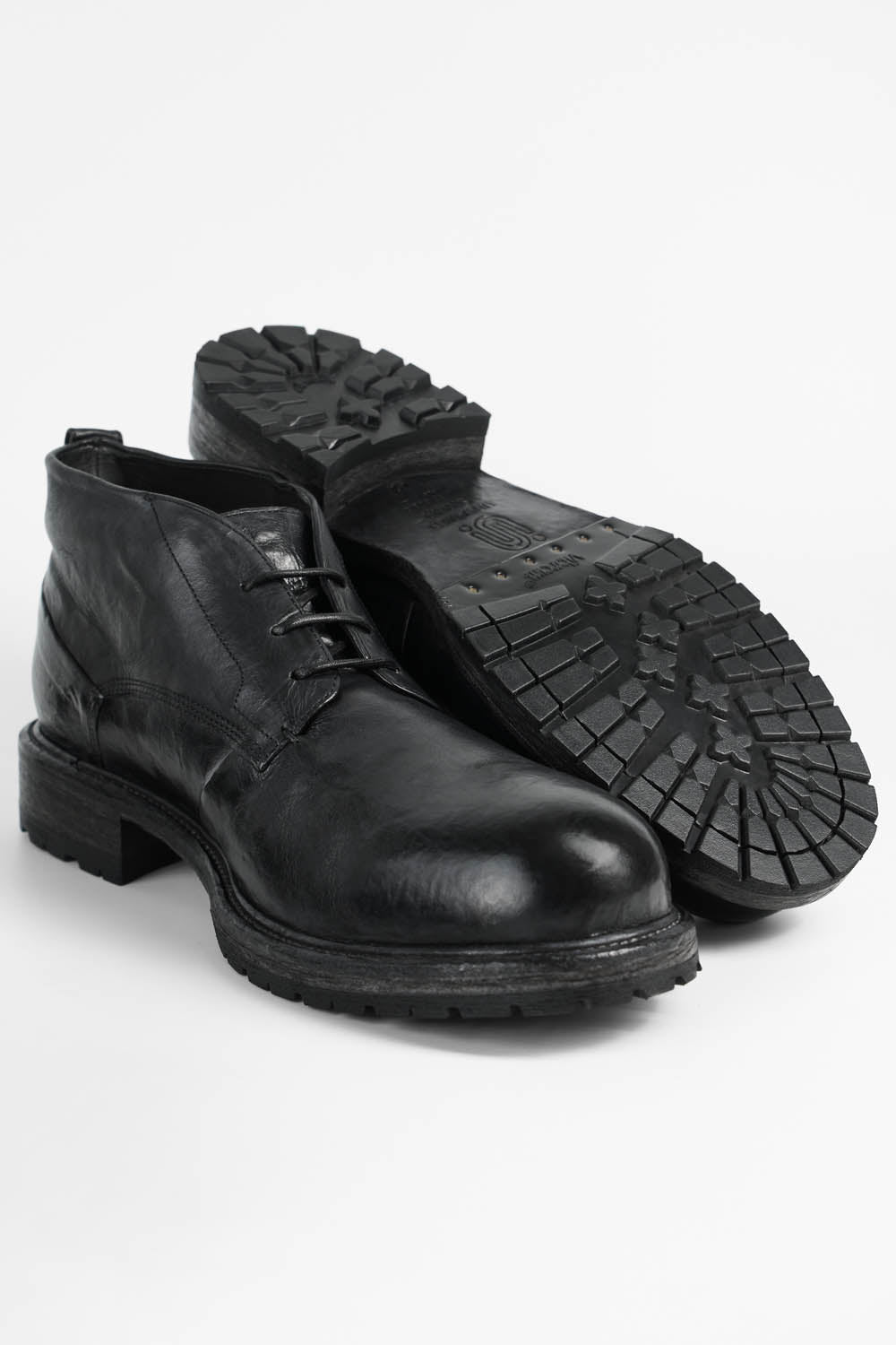 ROWLEY coal-black folded chukka boots.