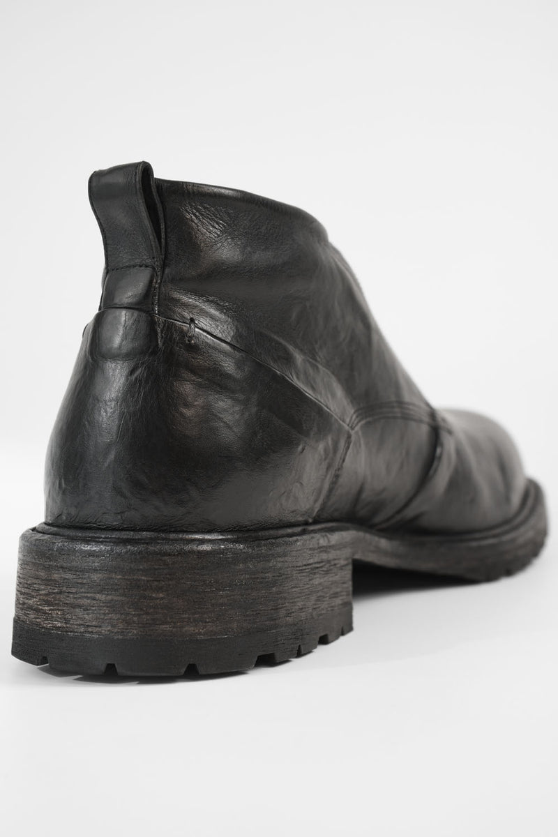 ROWLEY coal-black folded chukka boots.