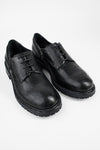 ROWLEY coal-black folded derby shoes.