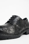 ROWLEY coal-black folded derby shoes.