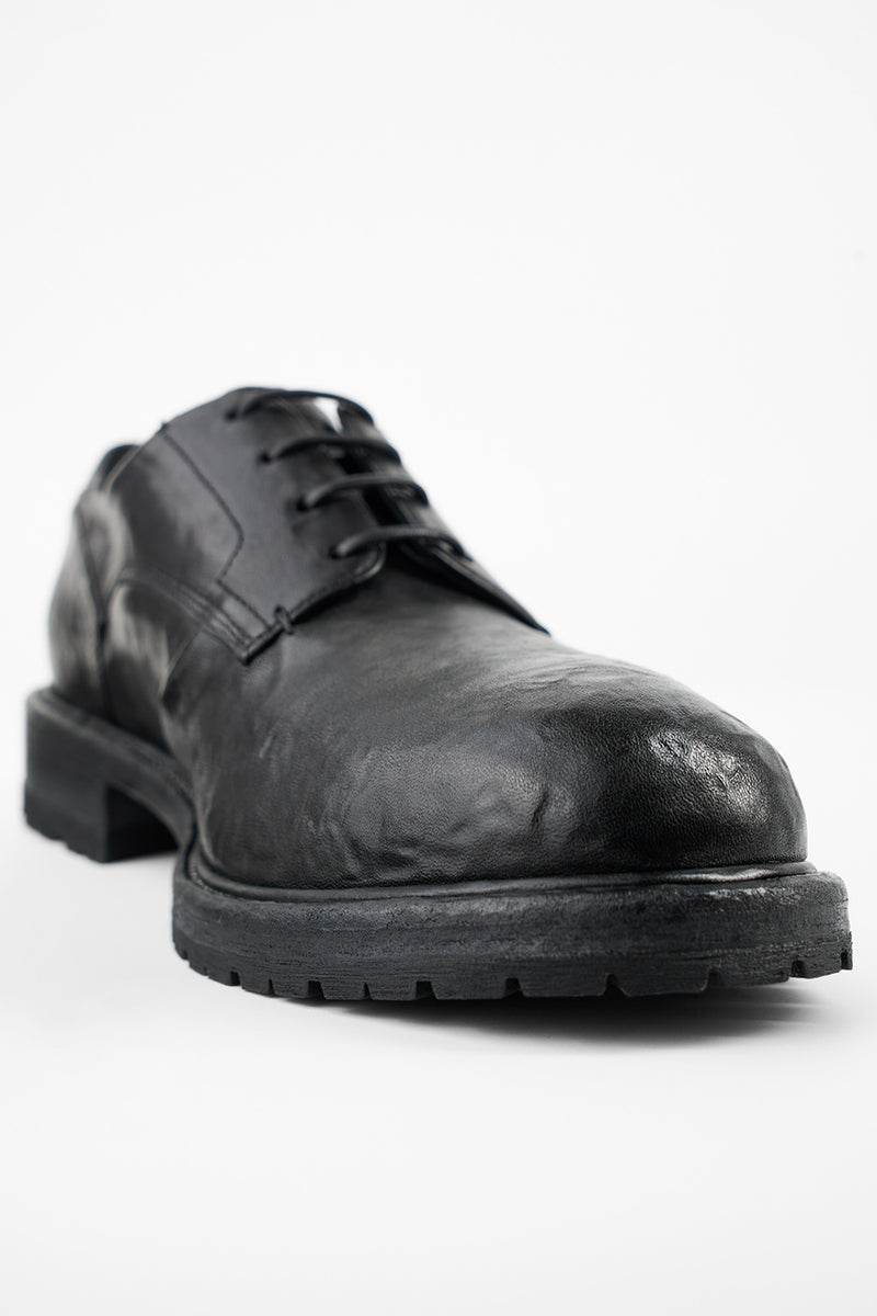 ROWLEY coal-black folded derby shoes.