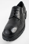 ROWLEY coal-black folded derby shoes.