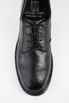 ROWLEY coal-black folded derby shoes.