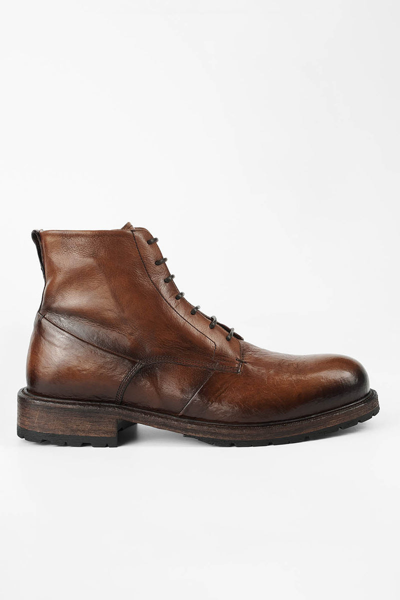 ROWLEY cognac folded lace up boots.