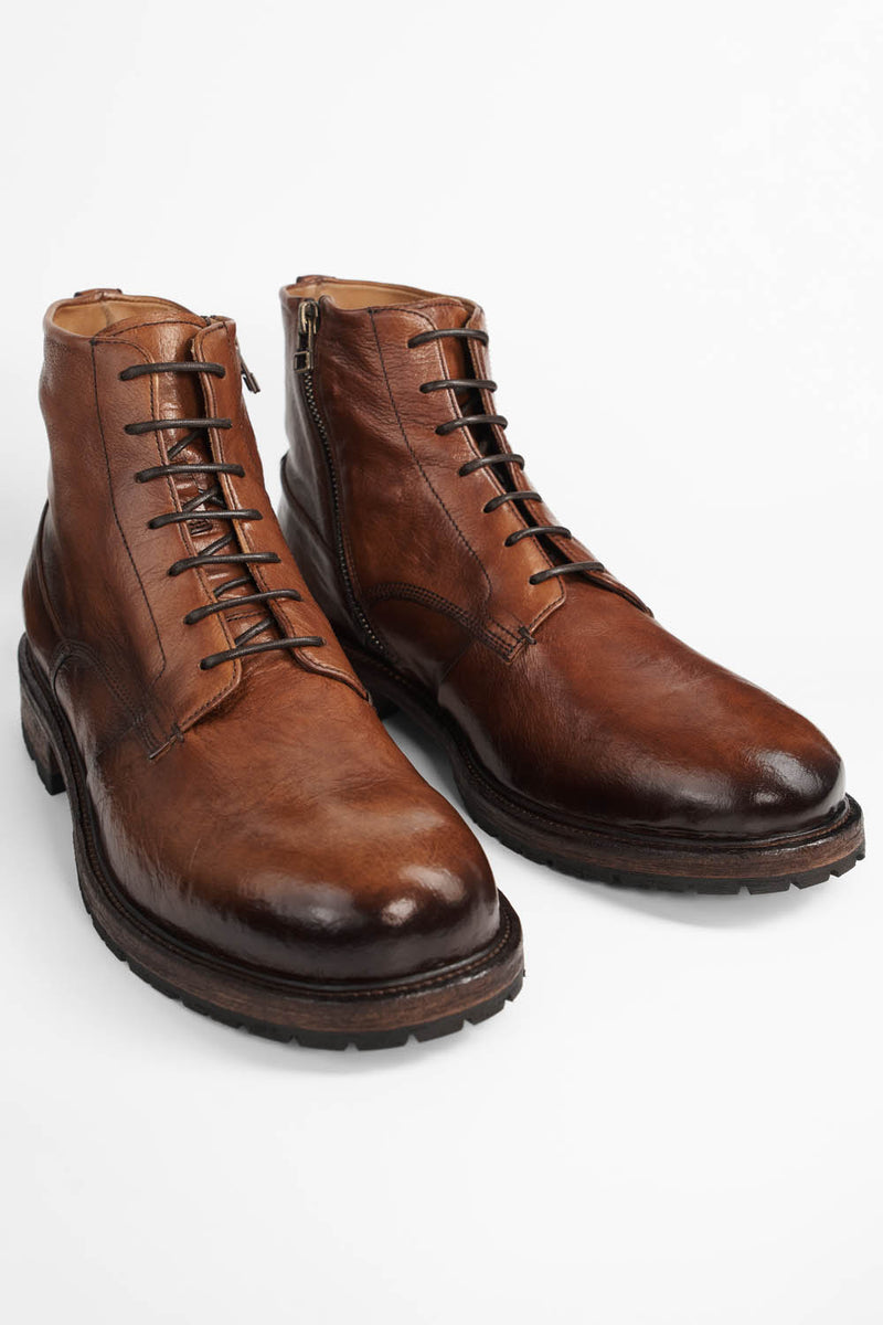 ROWLEY cognac folded lace up boots.