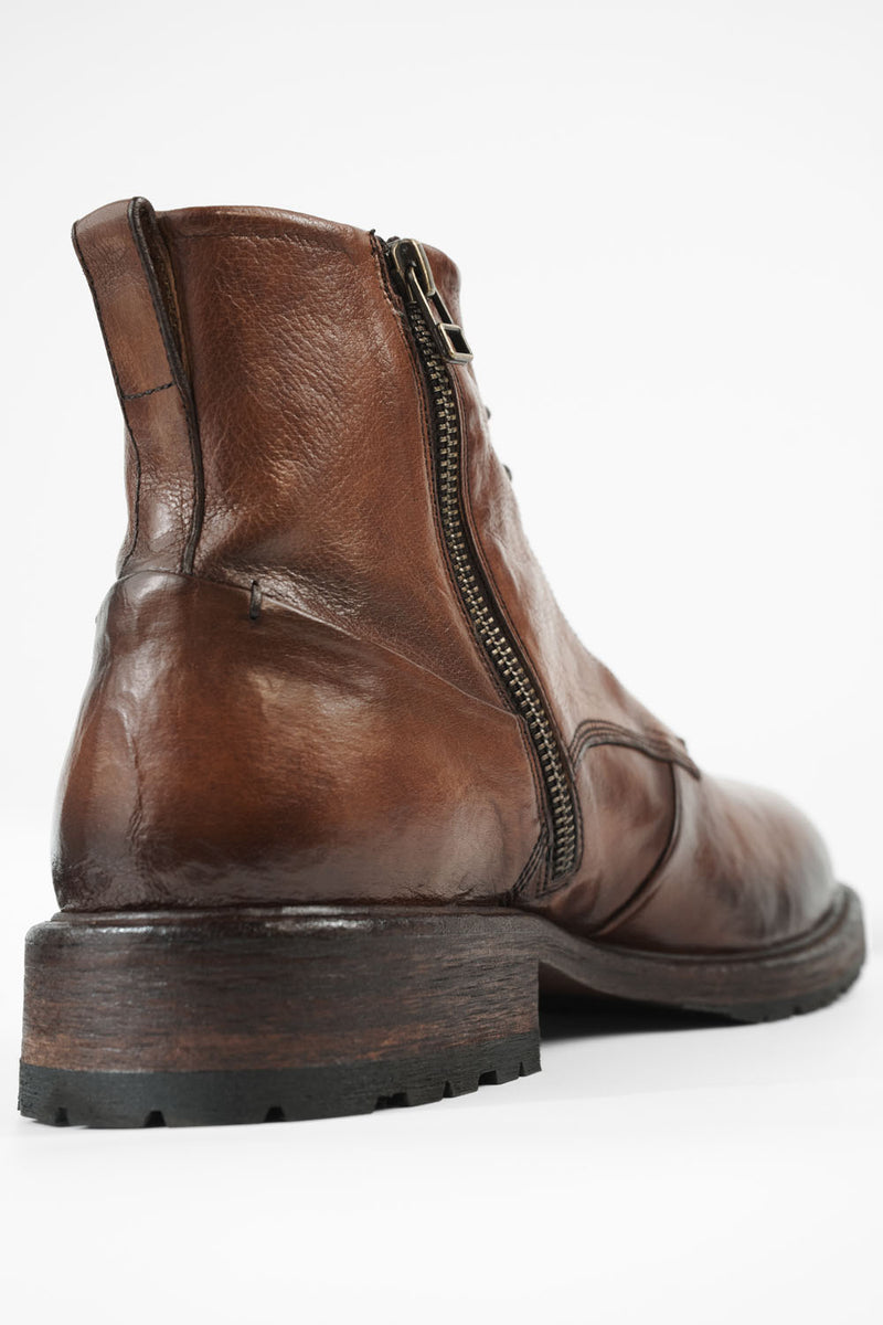 ROWLEY cognac folded lace up boots.