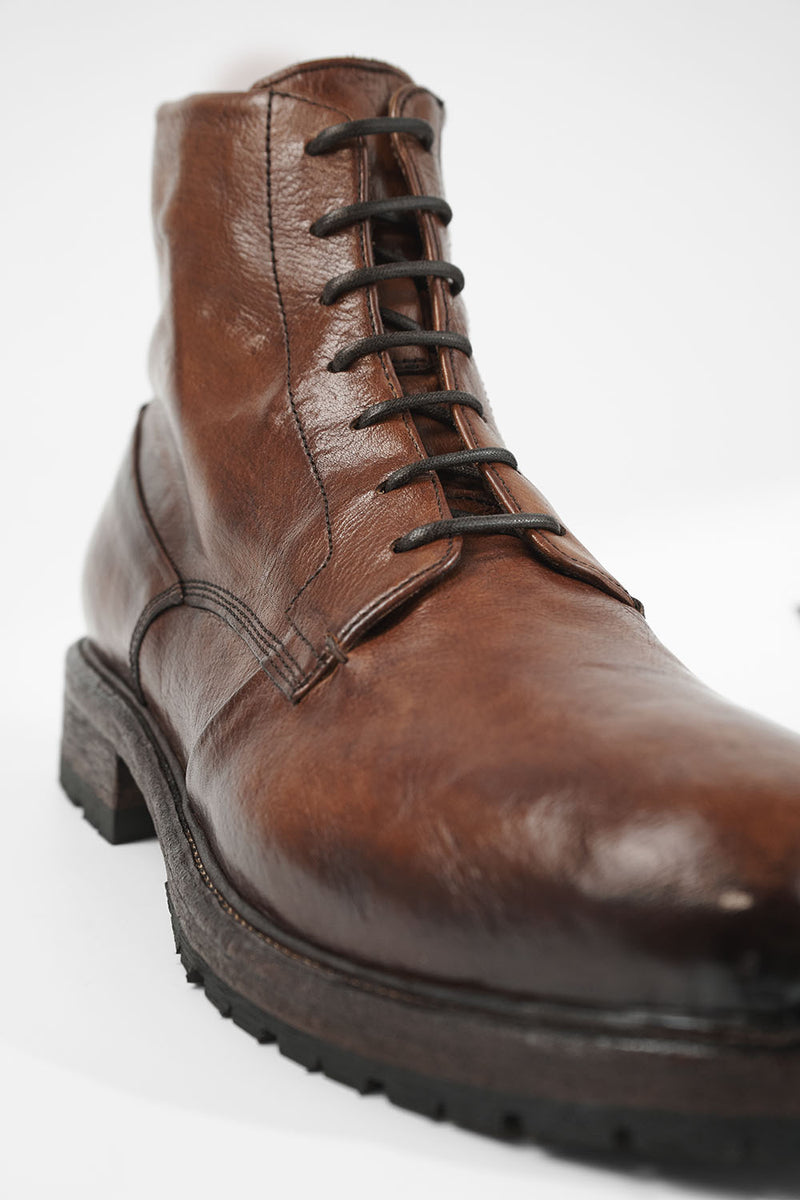 ROWLEY cognac folded lace up boots.