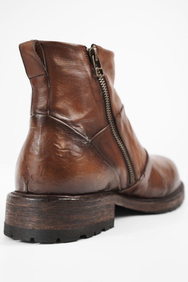 ROWLEY cognac folded laceless boots.