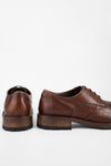 ROWLEY cognac folded derby shoes.