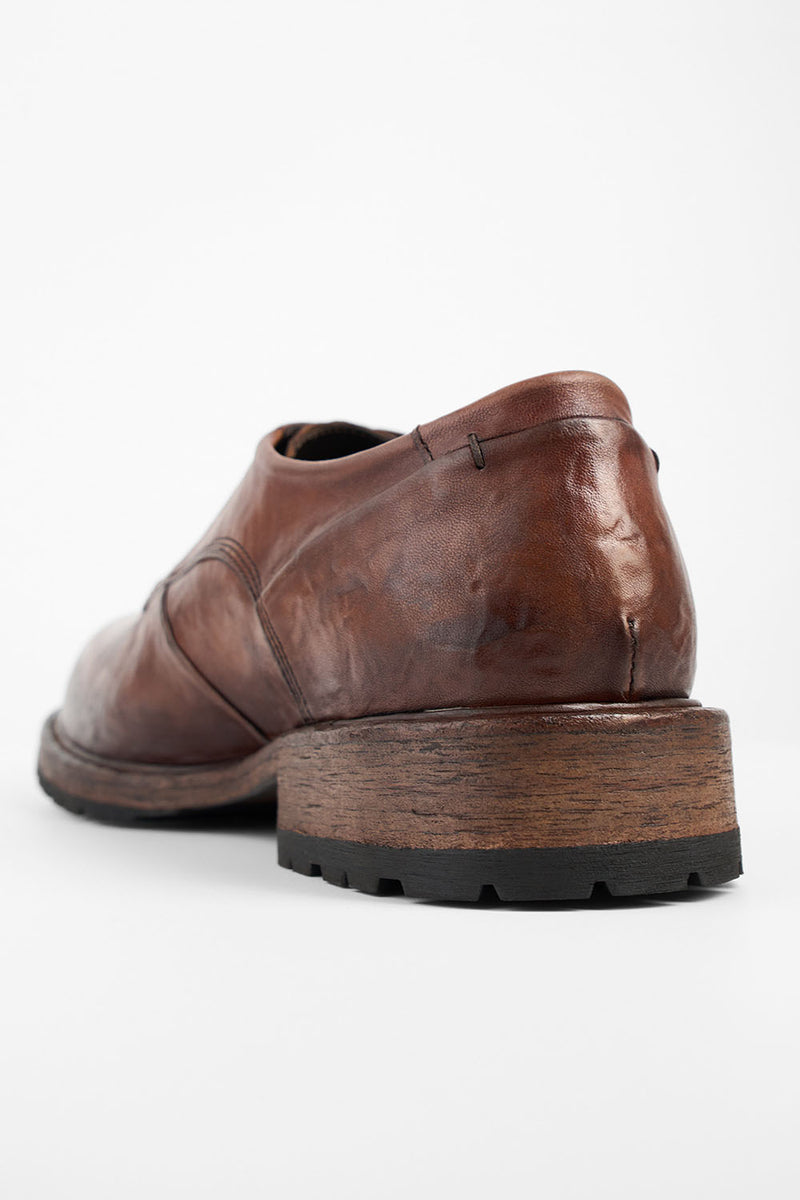 ROWLEY cognac folded derby shoes.