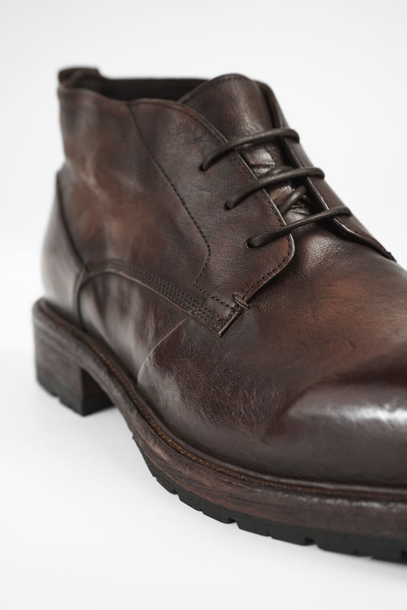 ROWLEY raw-chestnut folded chukka boots.