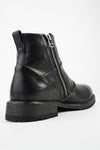 ROWLEY jet-black folded laceless boots.