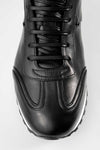 SOHO tuxedo-black wingtip runners.