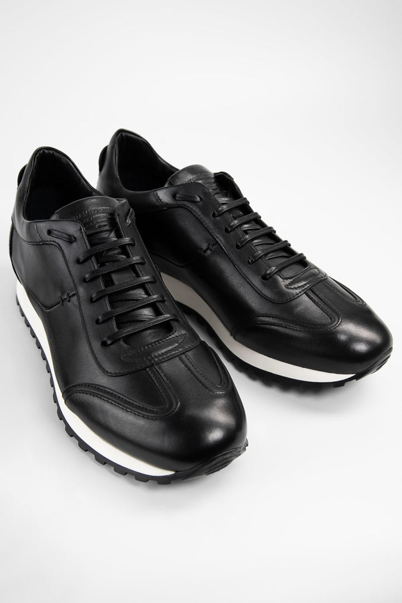 SOHO tuxedo-black wingtip runners.