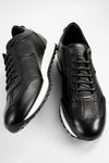 SOHO tuxedo-black wingtip runners.