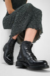 AVERY jet-black grunge military boots.