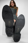 AVERY jet-black grunge military boots.