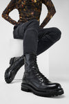 CAMDEN jet-black military boots.