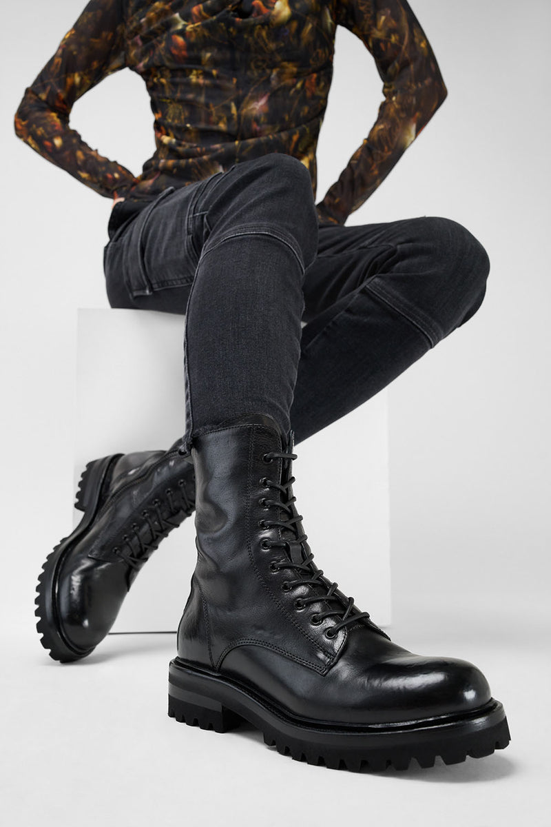 CAMDEN jet-black military boots.