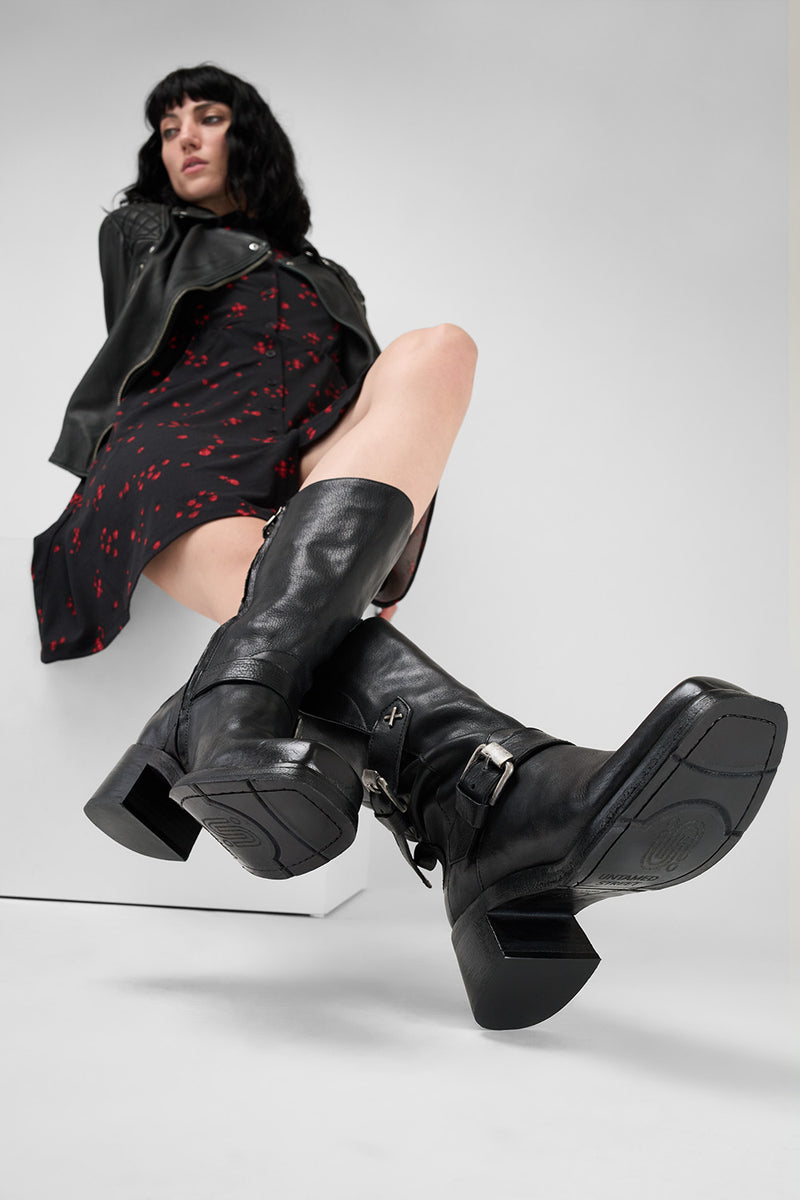 QUINN urban-black embellished high boots.