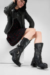 QUINN urban-black embellished high boots.