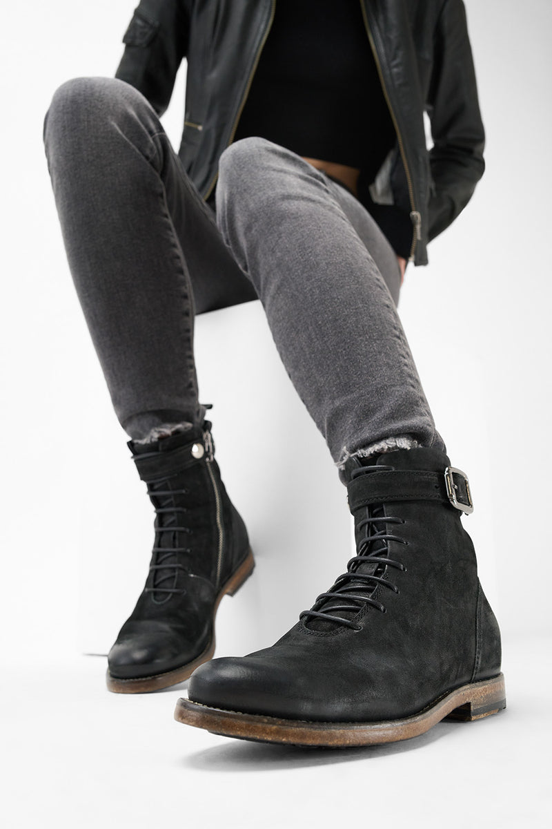 SLOANE matte-black lace up buckle boots.