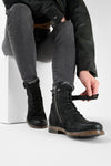 SLOANE matte-black lace up buckle boots.