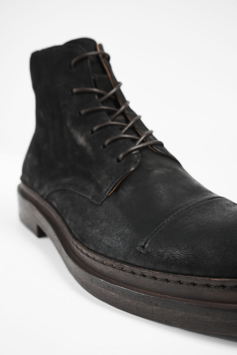 YALE distressed-black welted derby lace up boots.