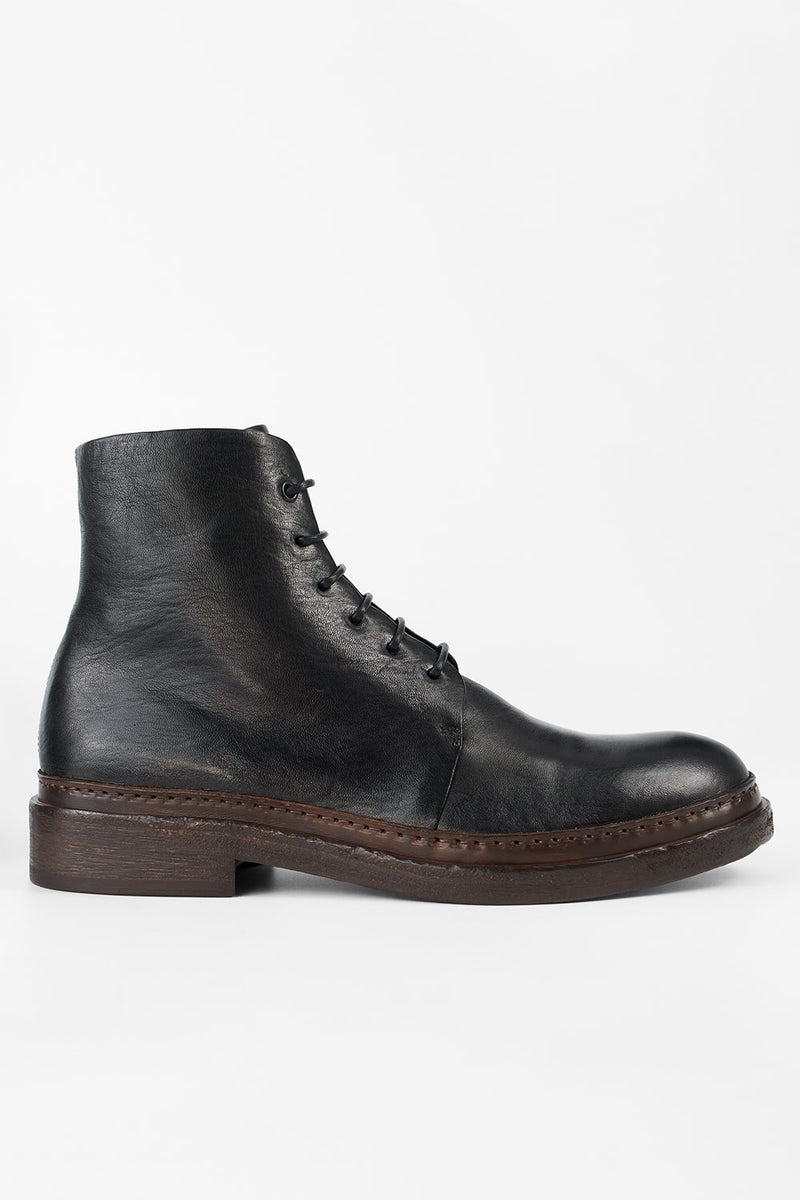 YALE tuxedo-black welted derby lace up boots.