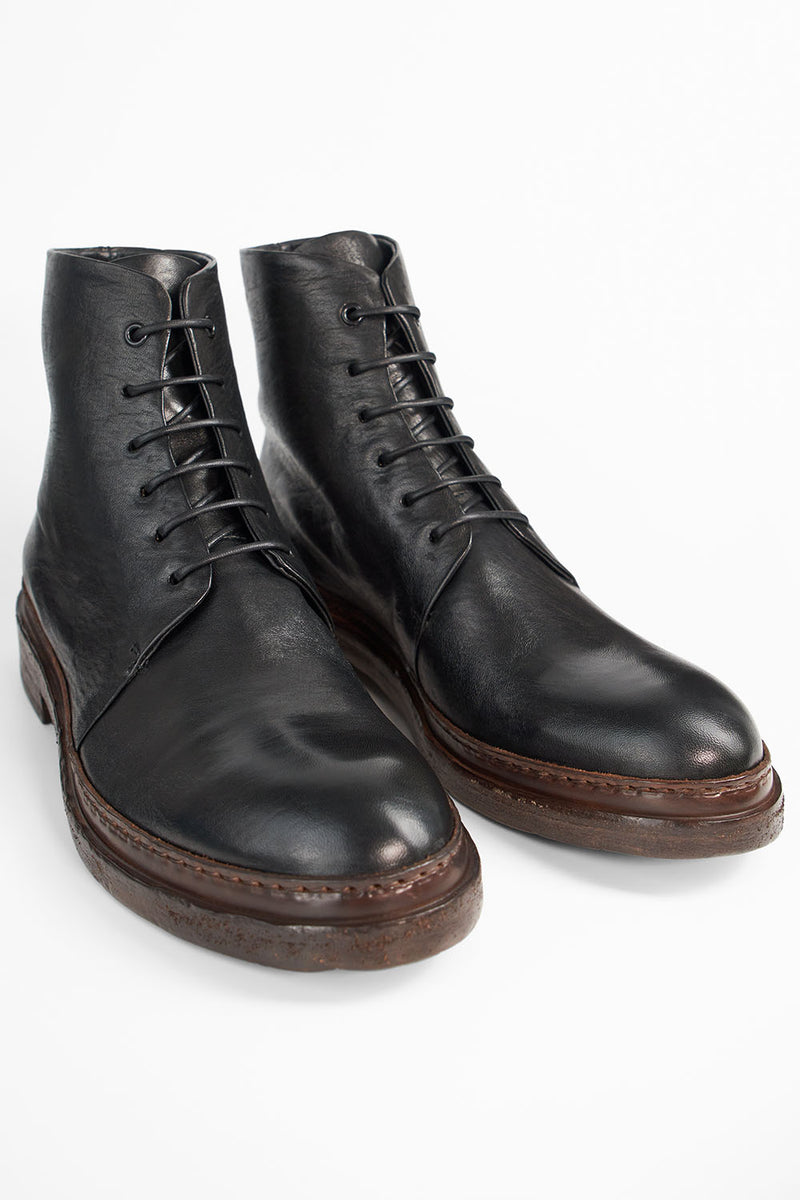 YALE tuxedo-black welted derby lace up boots.