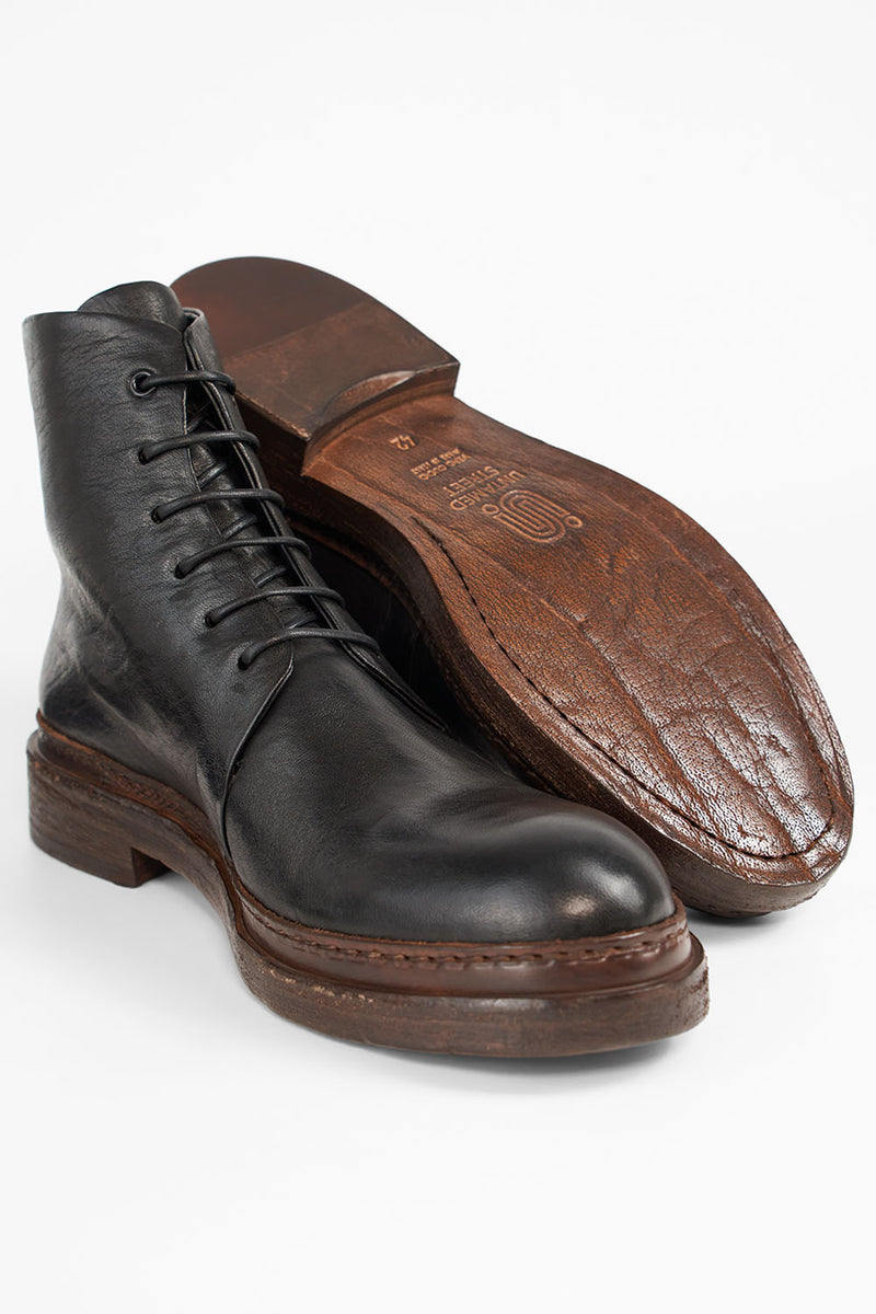 YALE tuxedo-black welted derby lace up boots.