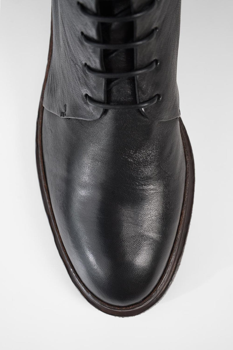 YALE tuxedo-black welted derby lace up boots.