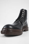 YALE tuxedo-black welted derby lace up boots.