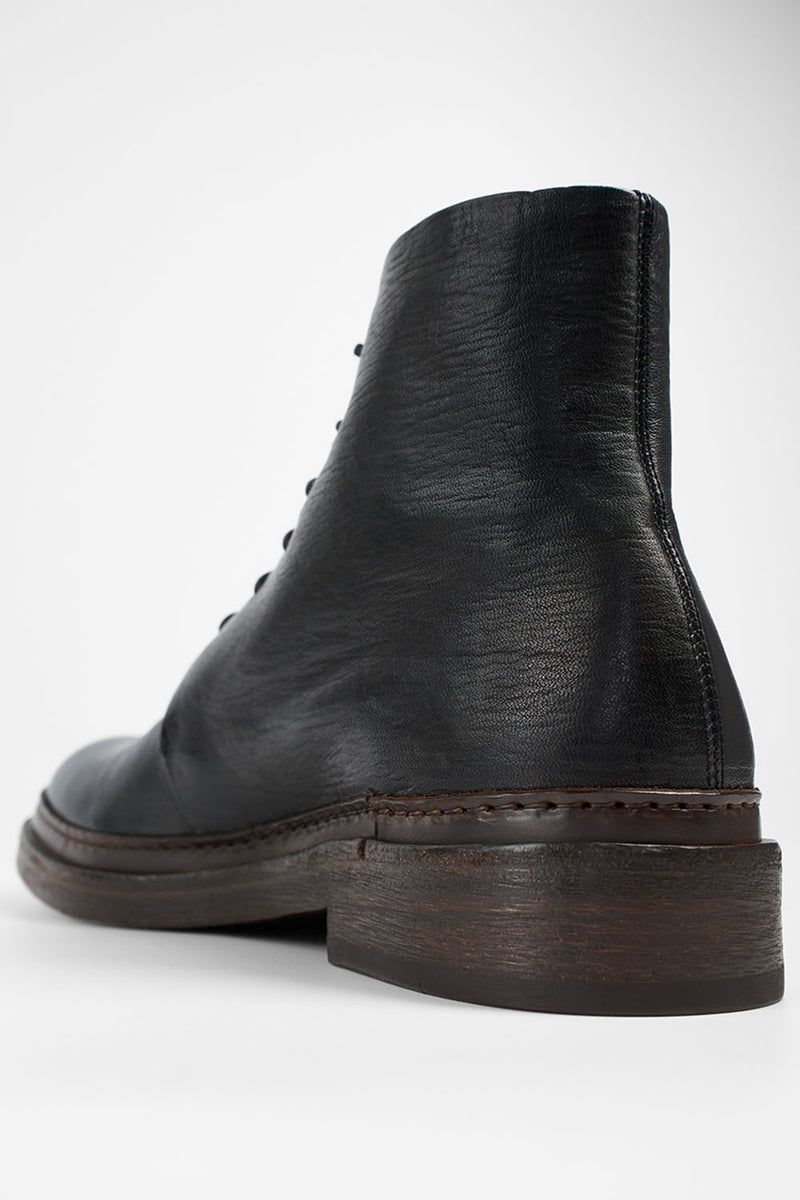 YALE tuxedo-black welted derby lace up boots.