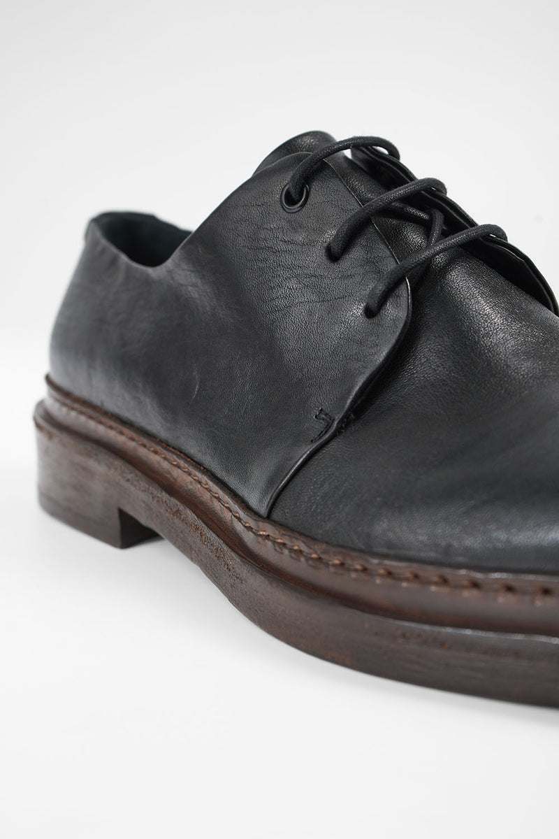 YALE tuxedo-black welted derby shoes.